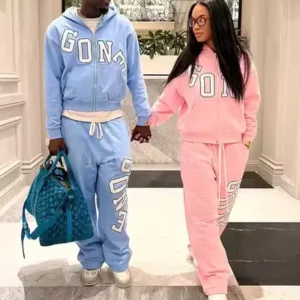 Men and women wearing blue and Pink Custom Embroidered Streetwear tracksuits